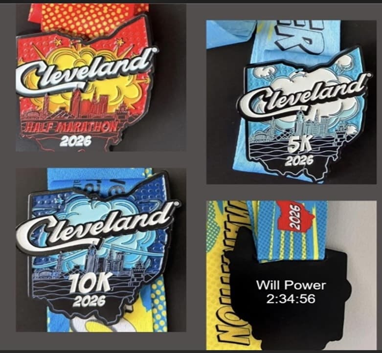 Cleveland Marathon medals — engraved back reads Will Power 2:34:56