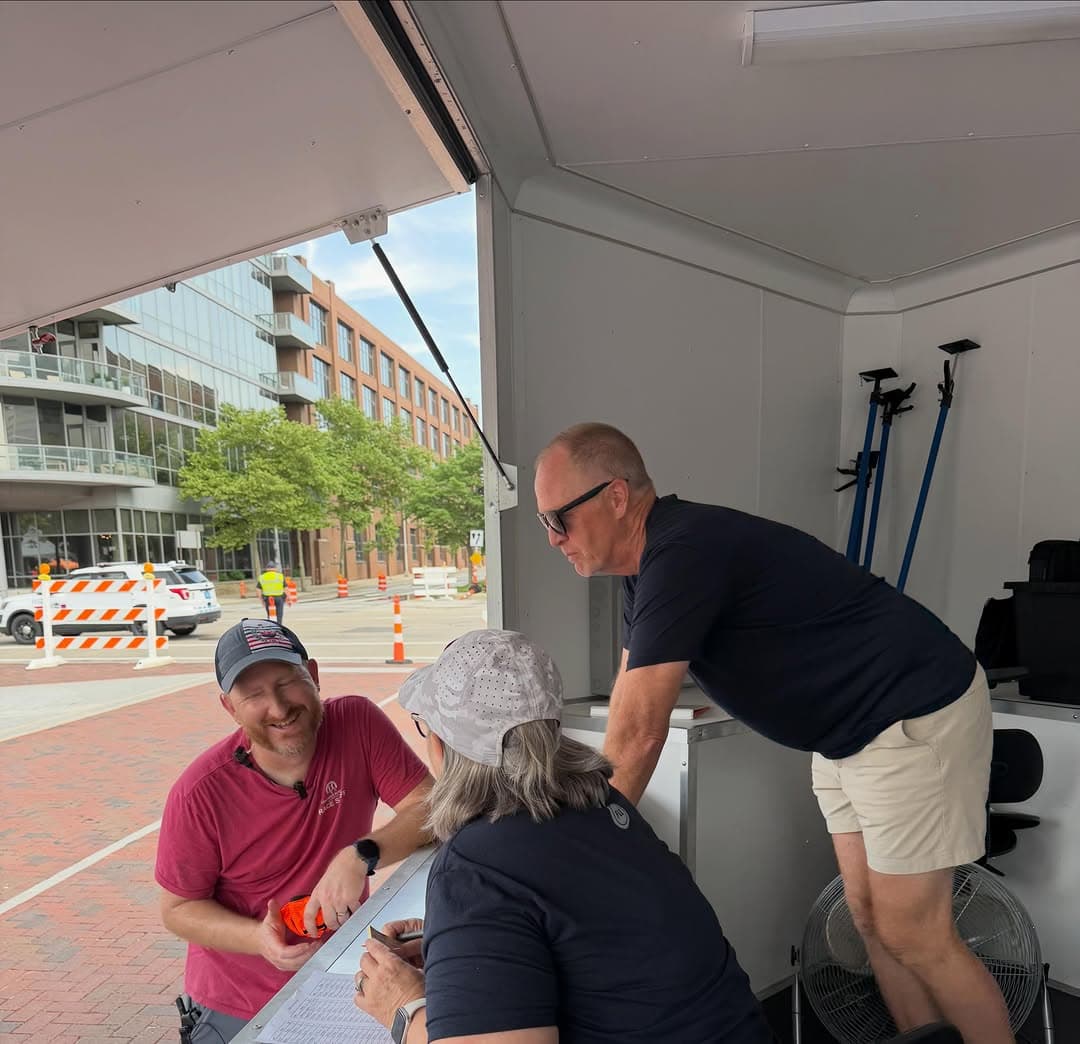 The Finish Line Engravers crew working from the station trailer on race morning