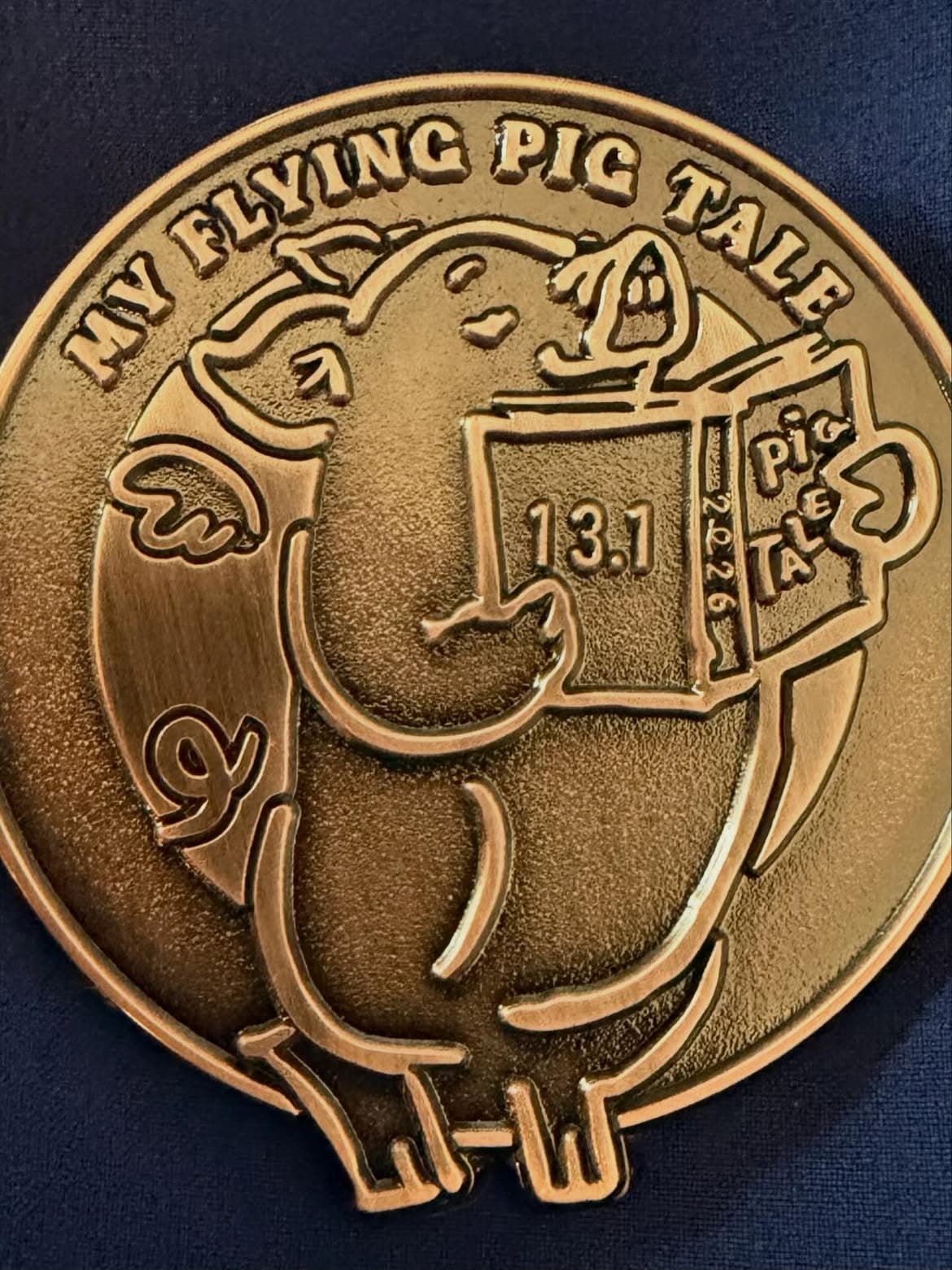 Flying Pig custom engraved commemorative pin — close-up detail